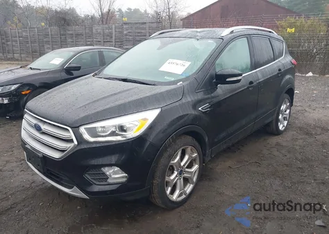 2019 Ford Escape Titanium z USA, uszkodzony, nr VIN 1FMCU9J93KUB18165